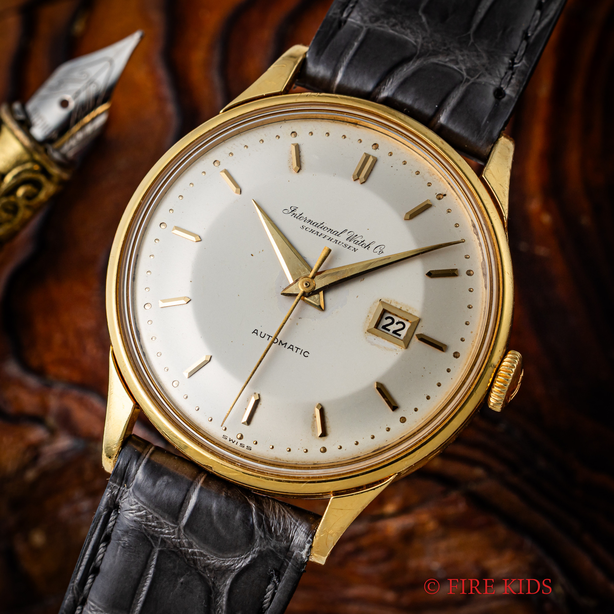 IWC ラウンドケース 1961年製 18金無垢 イエローゴールド 寄り目 ペラトン式自動巻き Cal.8531