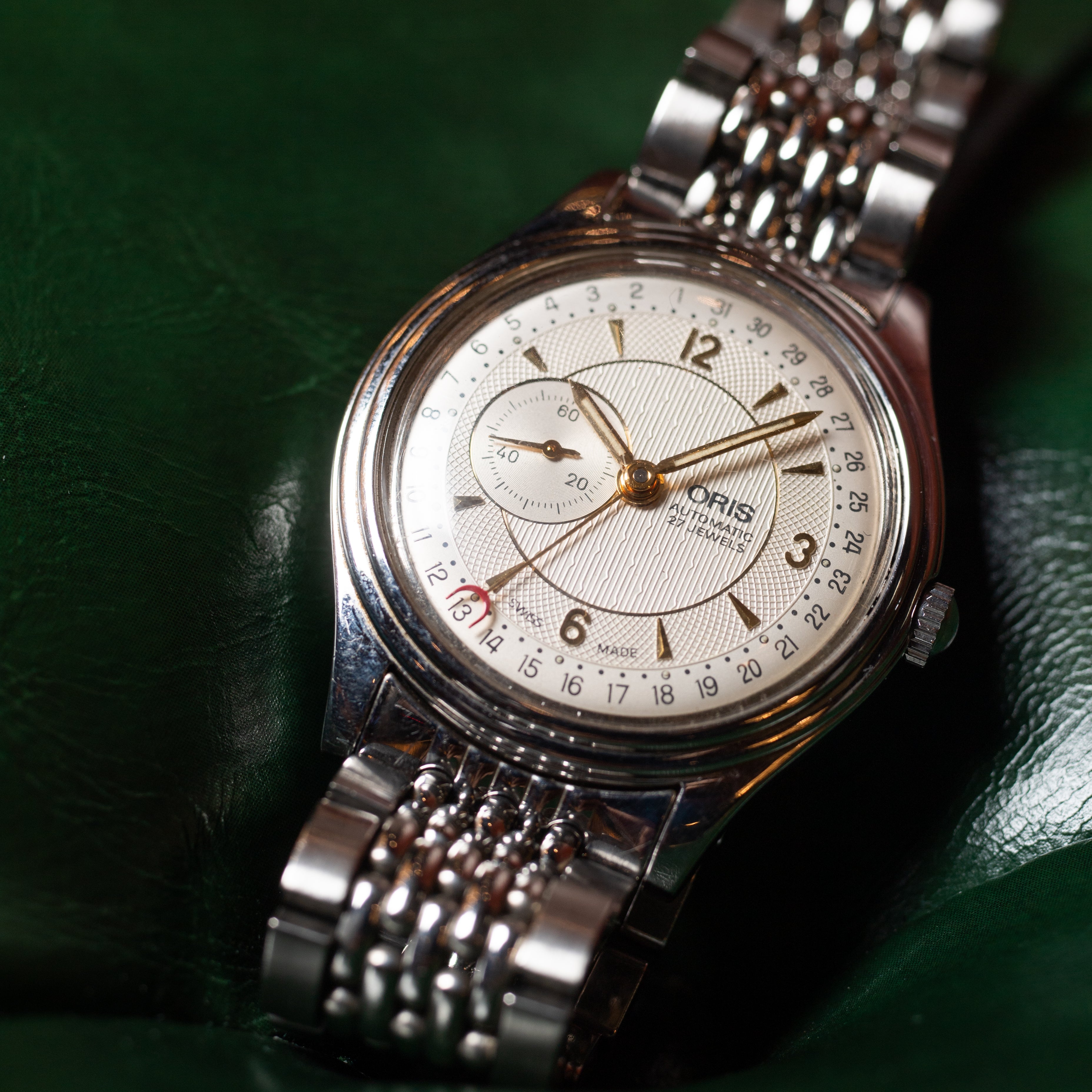 オリス ポインターデイト 純正ブレス オートマチック 1990年代 裏スケルトン