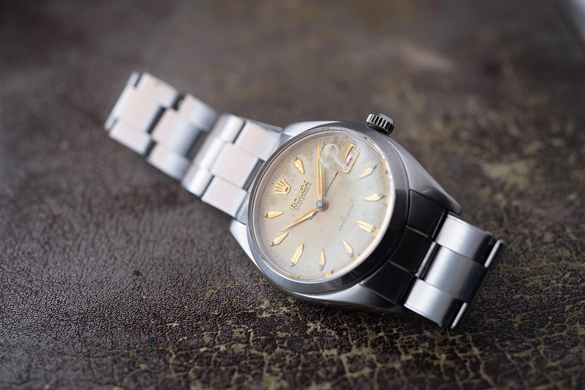 ロレックスオイスターデイト赤黒カレンダー Ref.6494 1957年製　出戻り