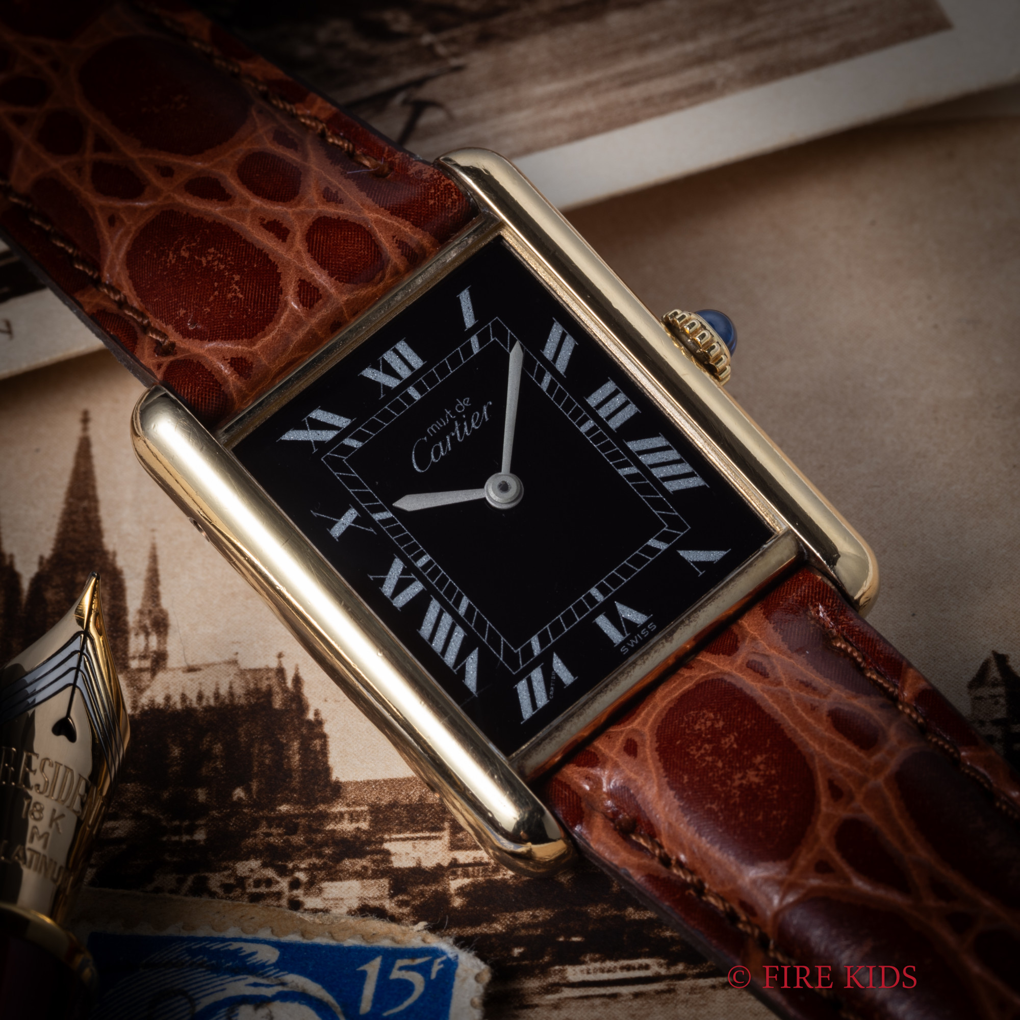 カルティエ マストタンク 1980年代製 LMサイズ ブラックローマンダイヤル 手巻 純正尾錠