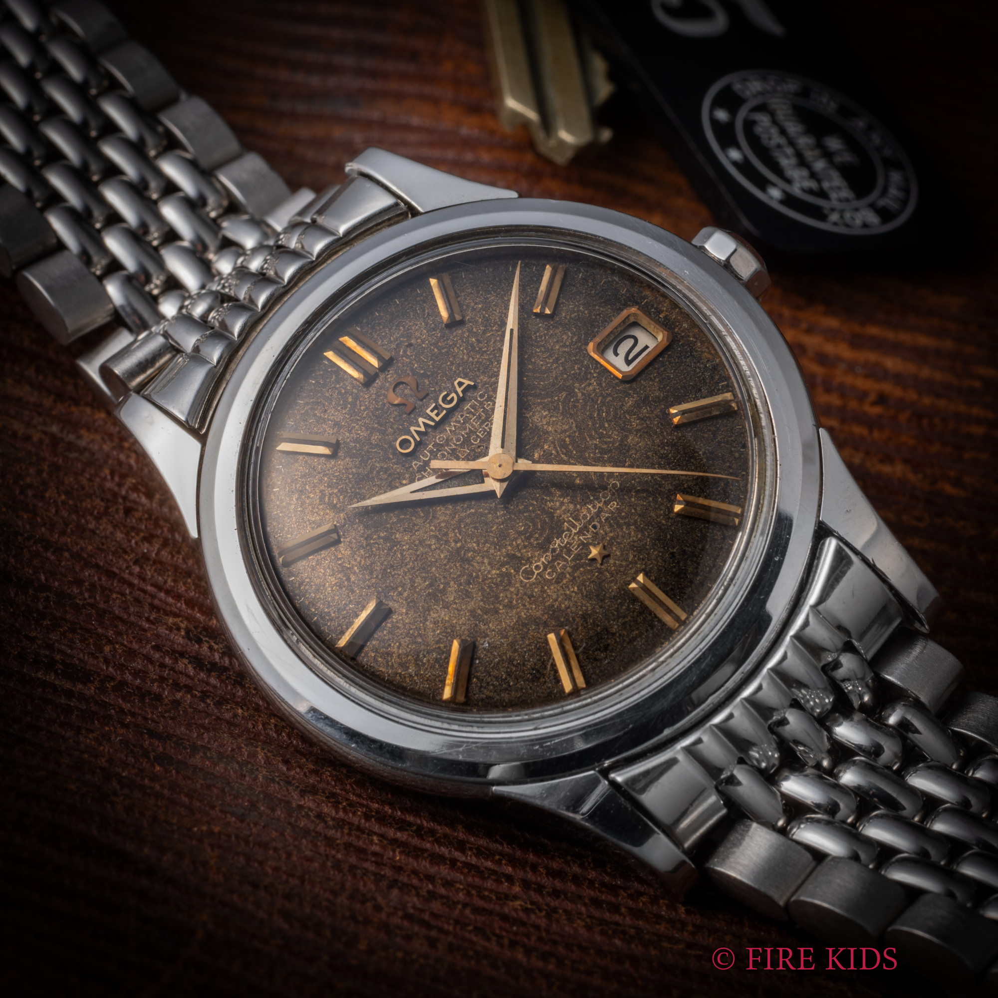 オメガ コンステレーション 1958年製 自動巻き ギルトダイヤル ブラウンチェンジ デイト付き 純正ライスブレス