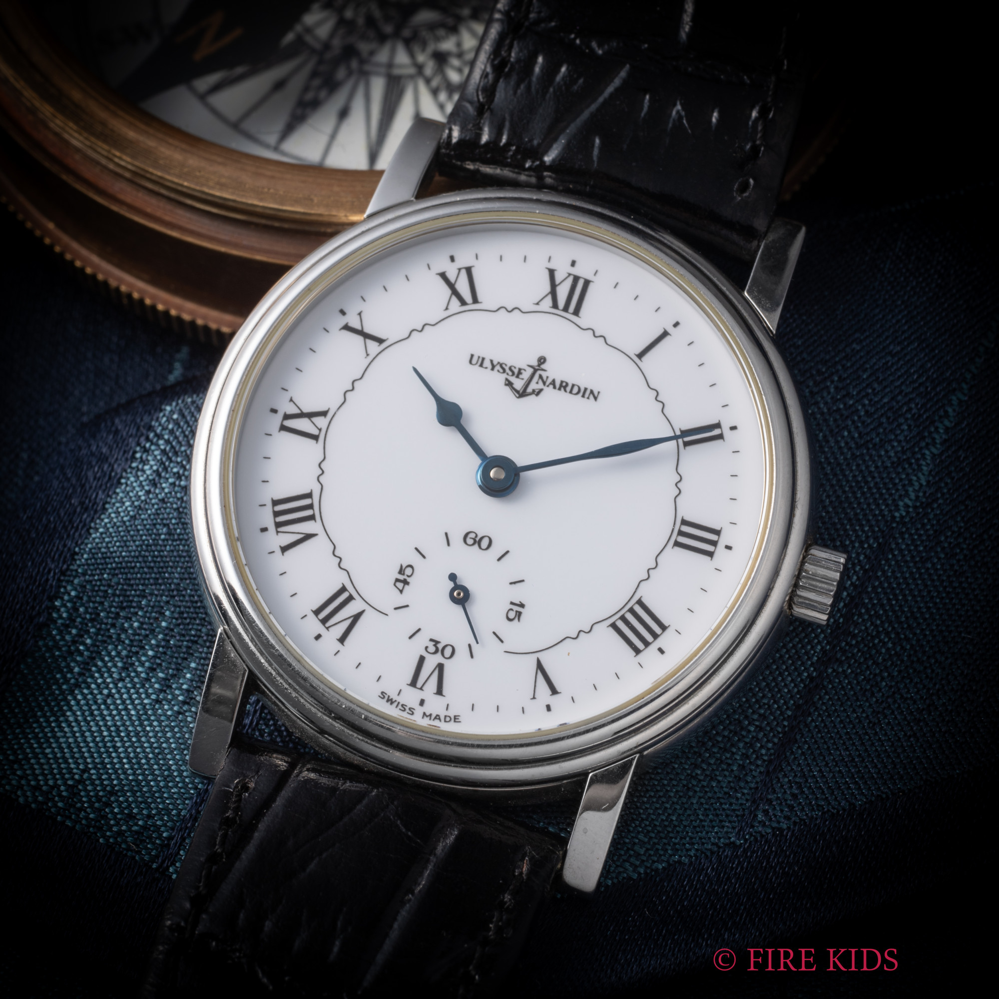 ユリス・ナルダン サンシアー 1990年代製 ホワイトローマンダイヤル スモールセコンド手巻 エナメル文字盤 純正尾錠