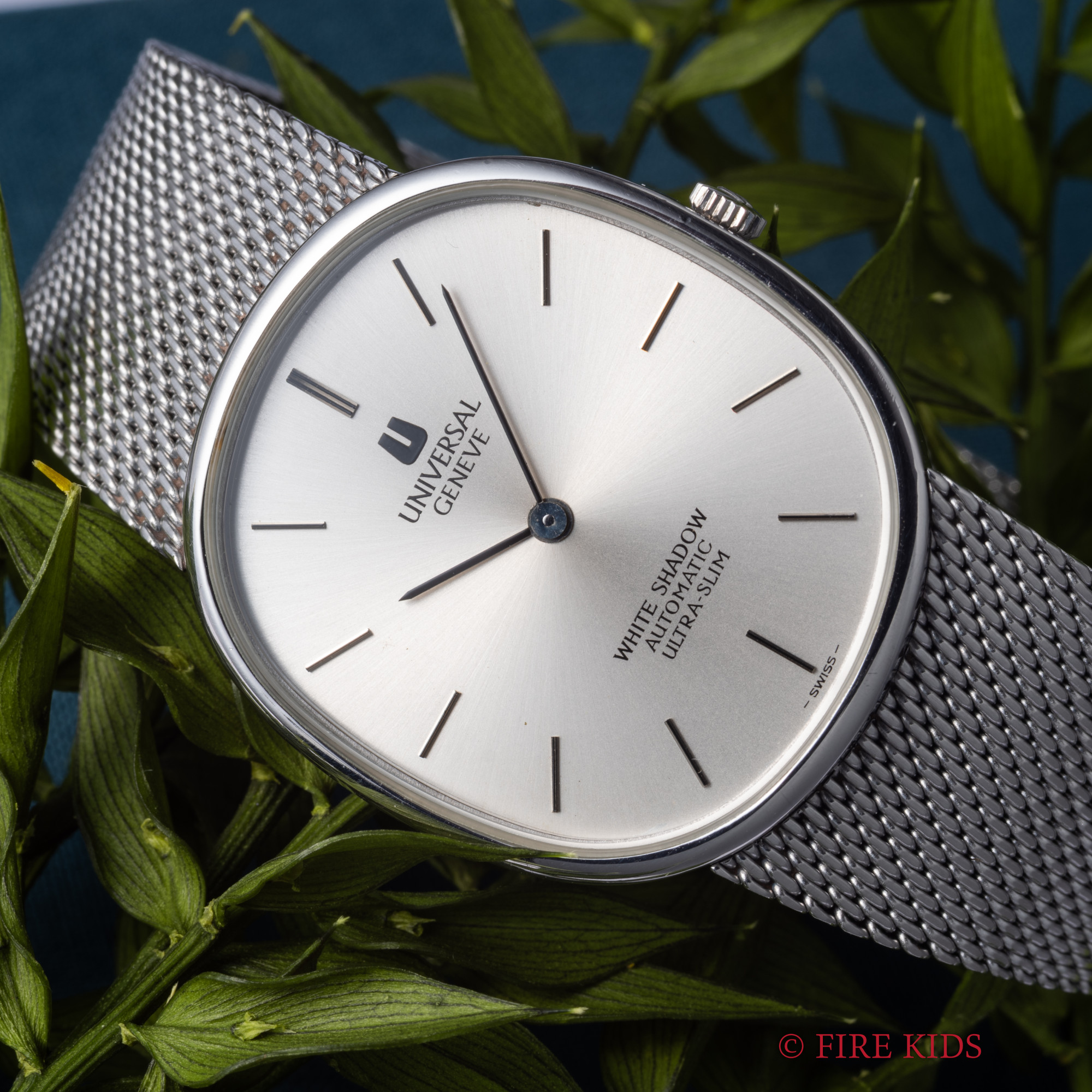 UNIVERSAL GENEVE　ユニバーサルジュネーブホワイトシャドゥ1970年代製 マイクロローター 自動巻 Ref.866049 ブレス一体型 ヴェルティカル
