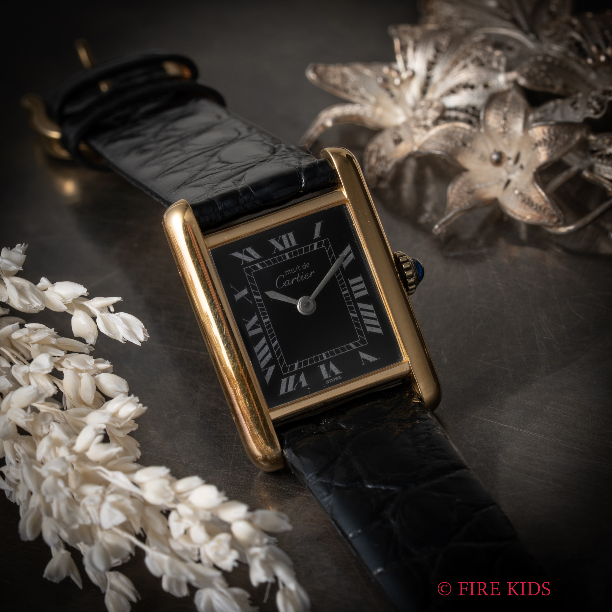 カルティエ CARTIER マストタンクSM 1970年代製 ブラックローマン 手巻 1979年販売ギャラ付 純正尾錠