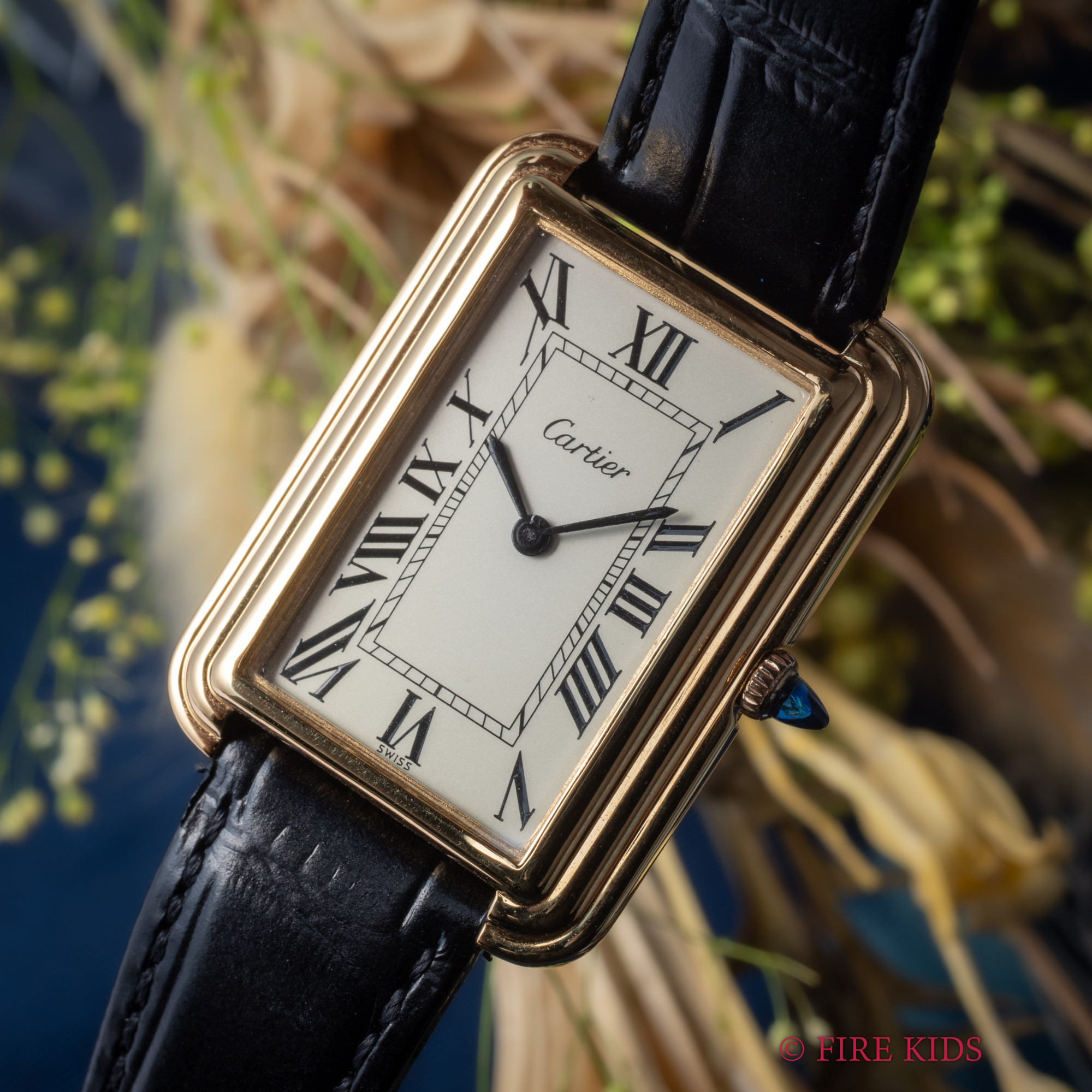 カルティエ CARTIER ステップドタンク 金張り 1970年代製 プレマスト期 アイボリーローマン 手巻き 純正革ベルト、尾錠付き
