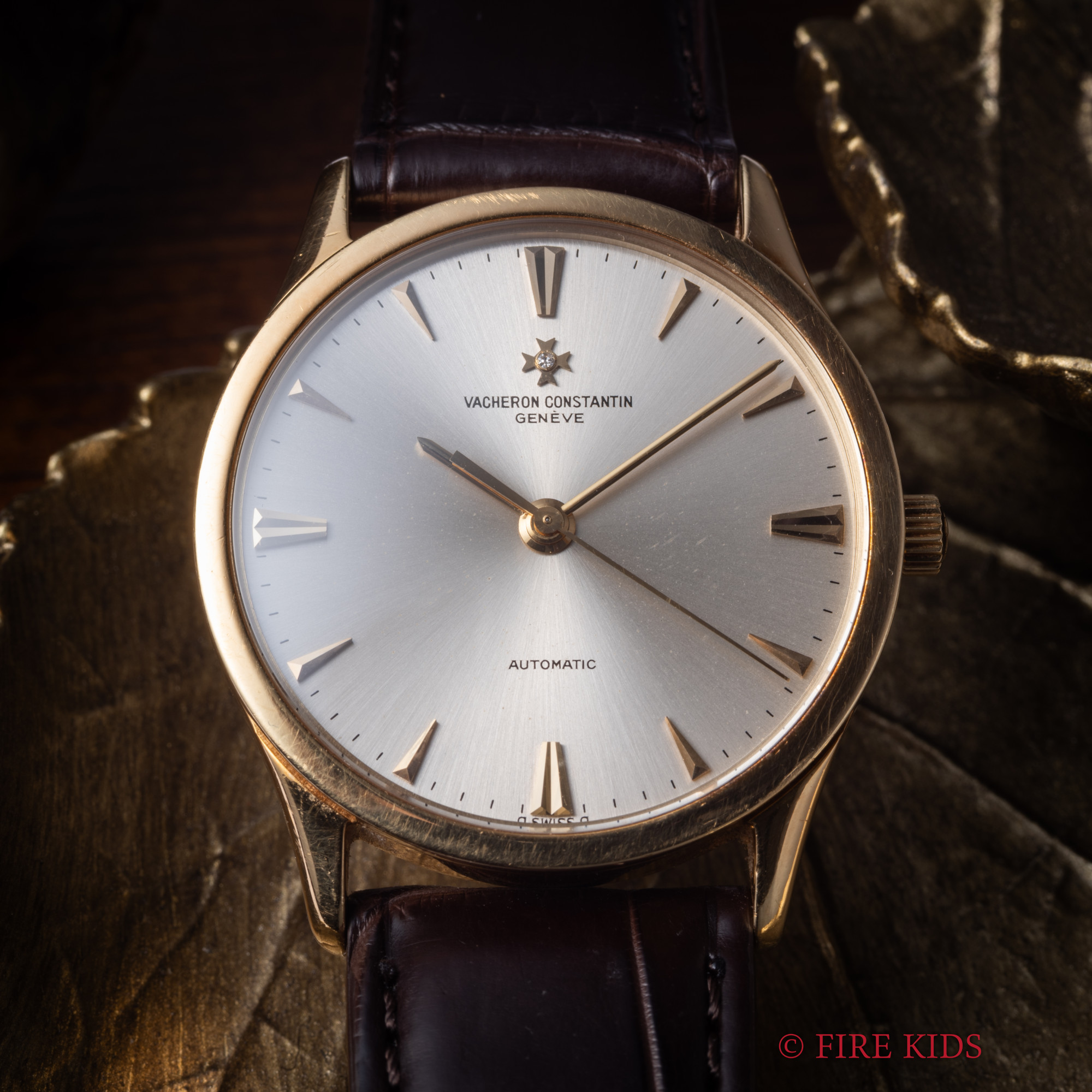 ヴァシュロンコンスタンタン VACHERON CONSTANTIN ラウンドケース 18KYG 1960年代製 マルタ十字 1Pダイヤ 自動巻き Cal.1124/1 楔インデックス シルバー文字盤