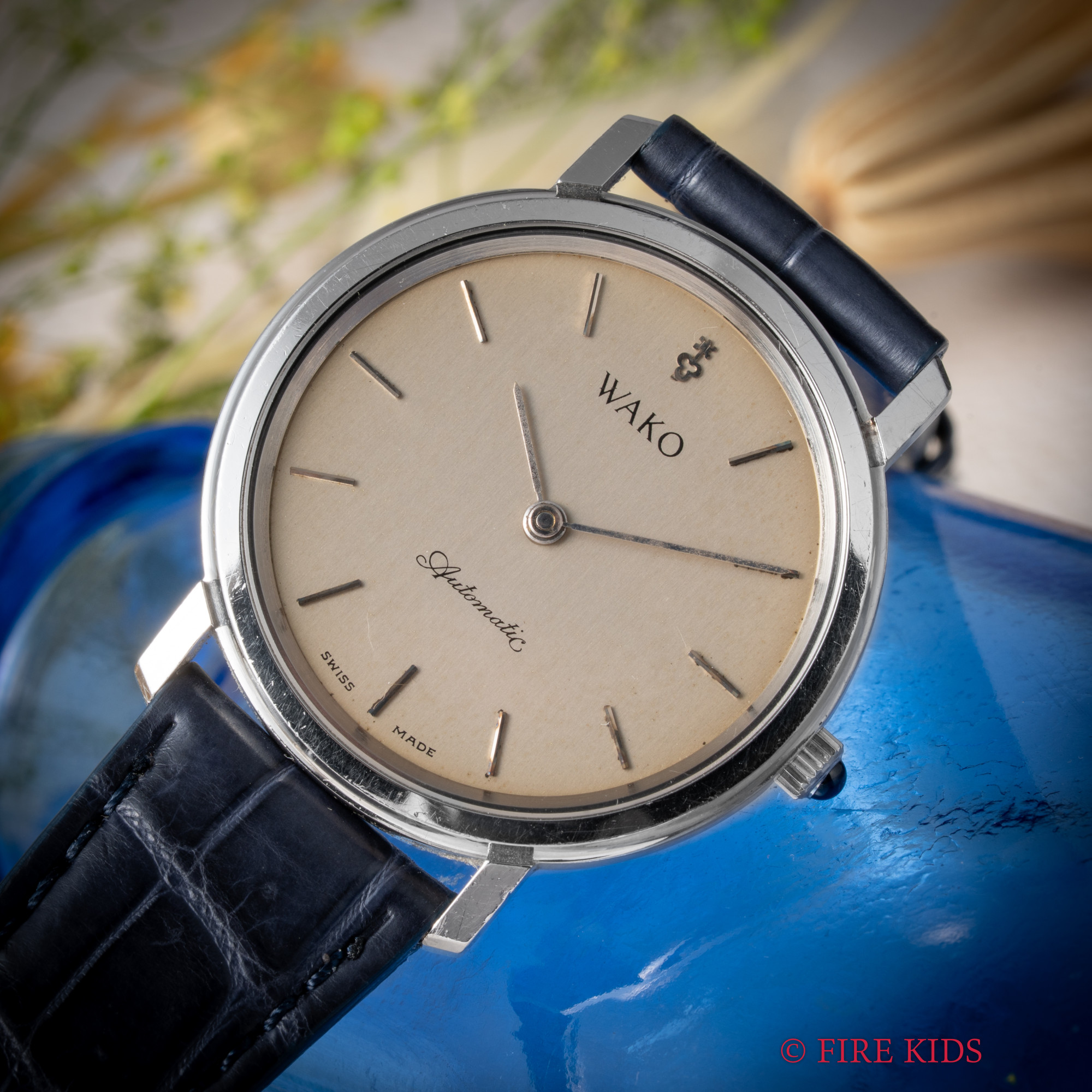 コルム CORUM ラウンドケース WAKOダブルネーム1980年代製  自動巻 シルバーダイヤル 純正革ベルト、尾錠付