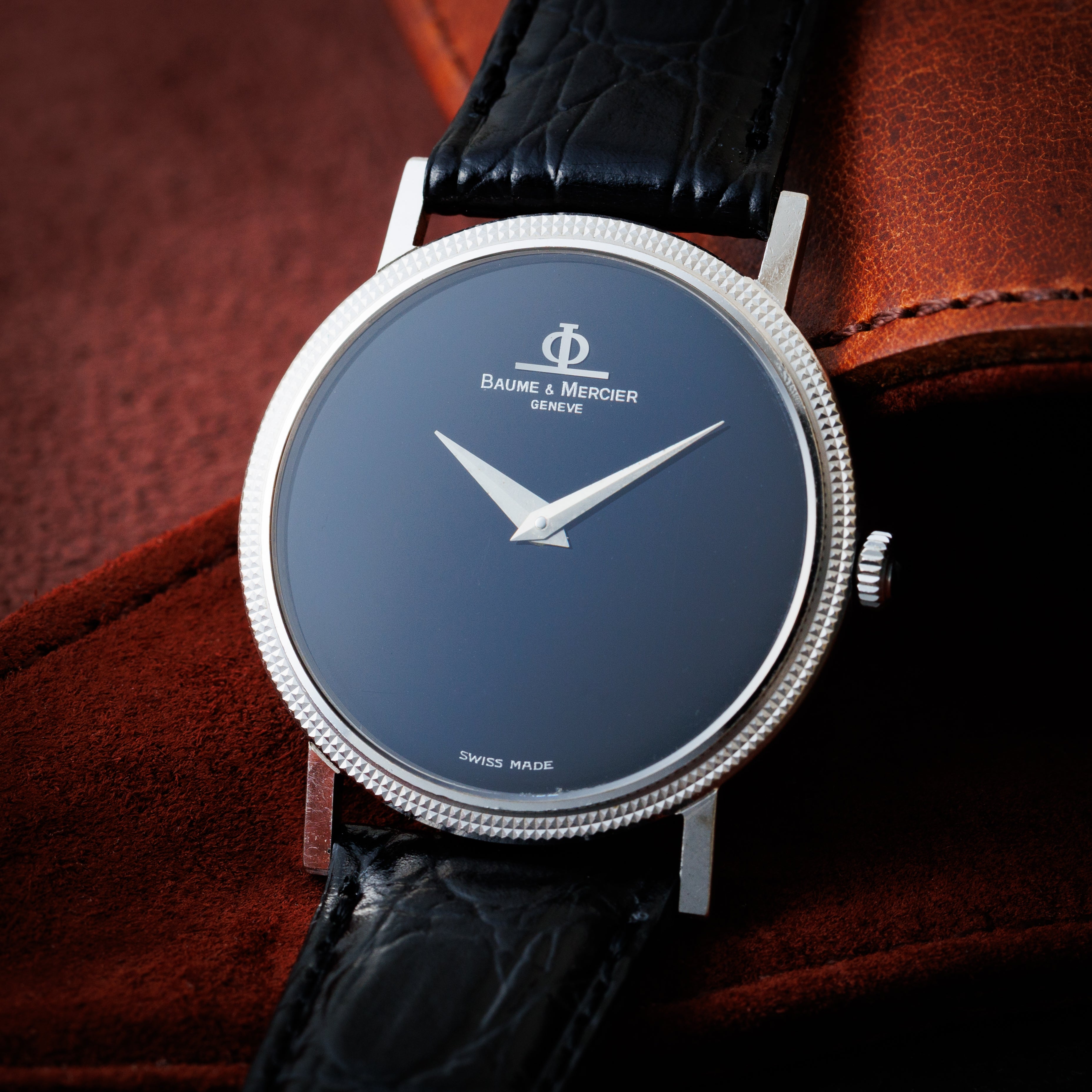 ボーム＆メルシエ ブラックダイヤル 手巻き ラウンドケース 18KWG Ref.35130 cal.1050 尾錠付き