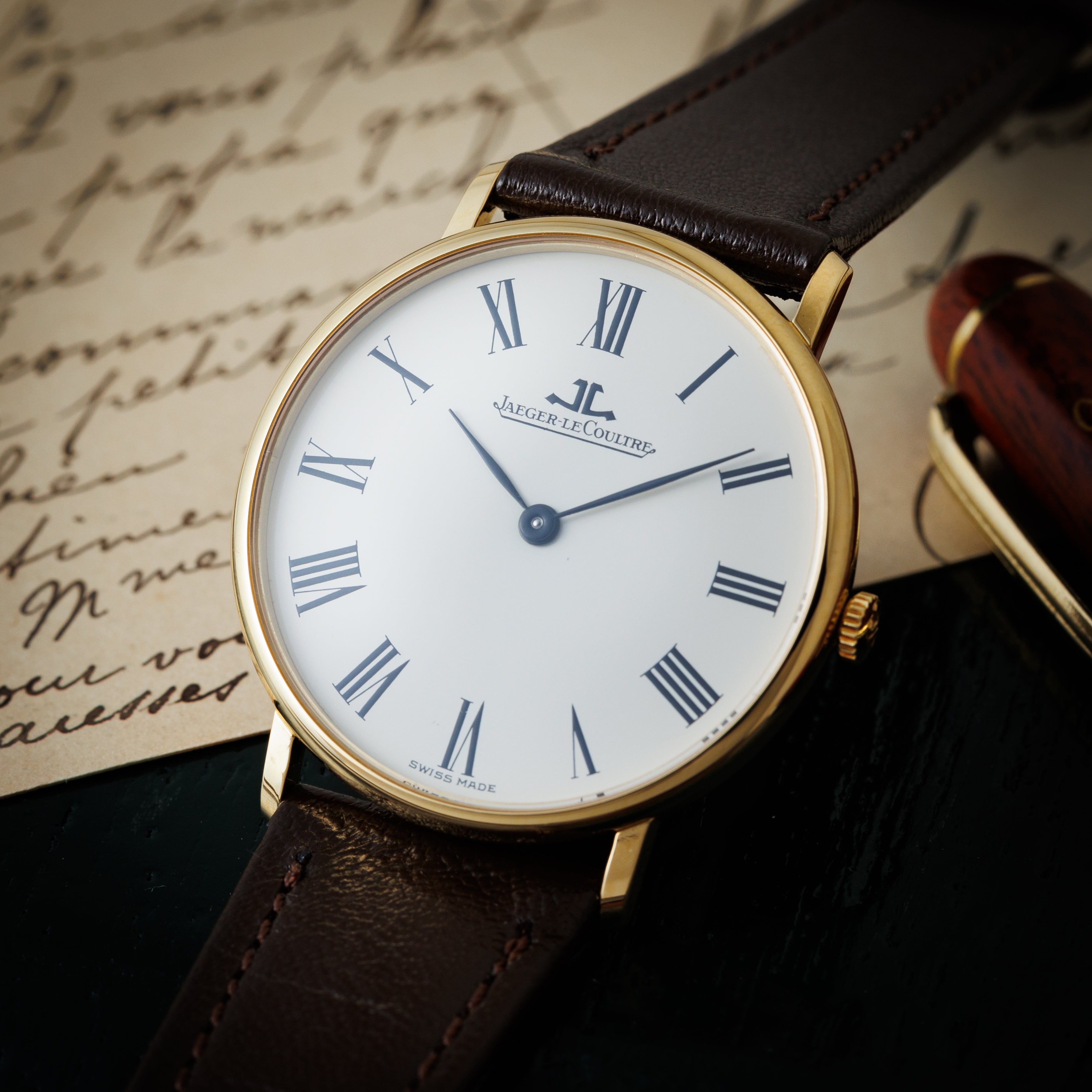 ジャガー・ルクルト ラウンド ホワイトローマンダイヤル 1960年代 18金無垢 手巻き Ref.9124-21 Cal.818/3 純正尾錠付き