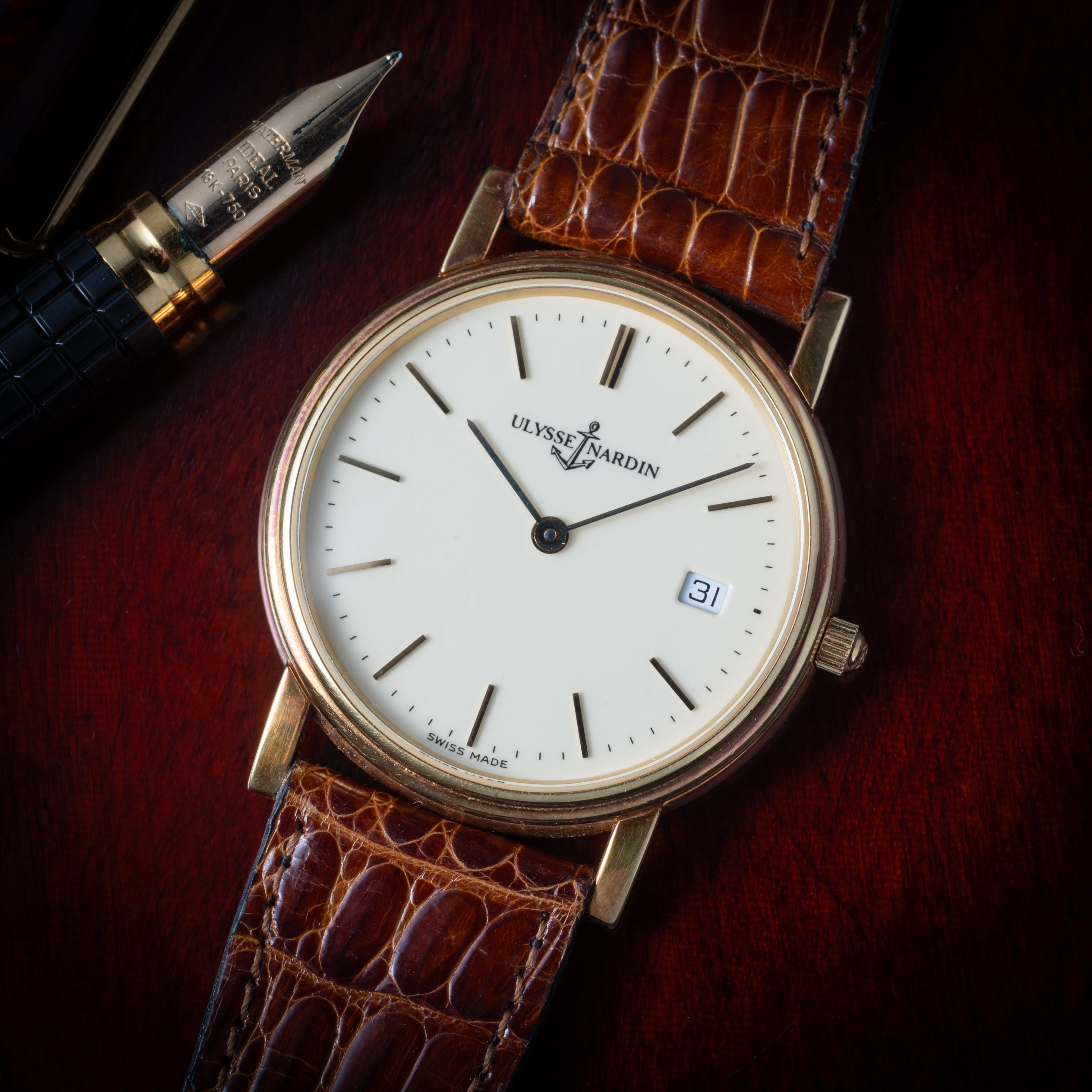 ユリスナルダン 18金無垢 エナメルダイヤル 裏スケルトン 1990年代製 自動巻き 純正尾錠付き