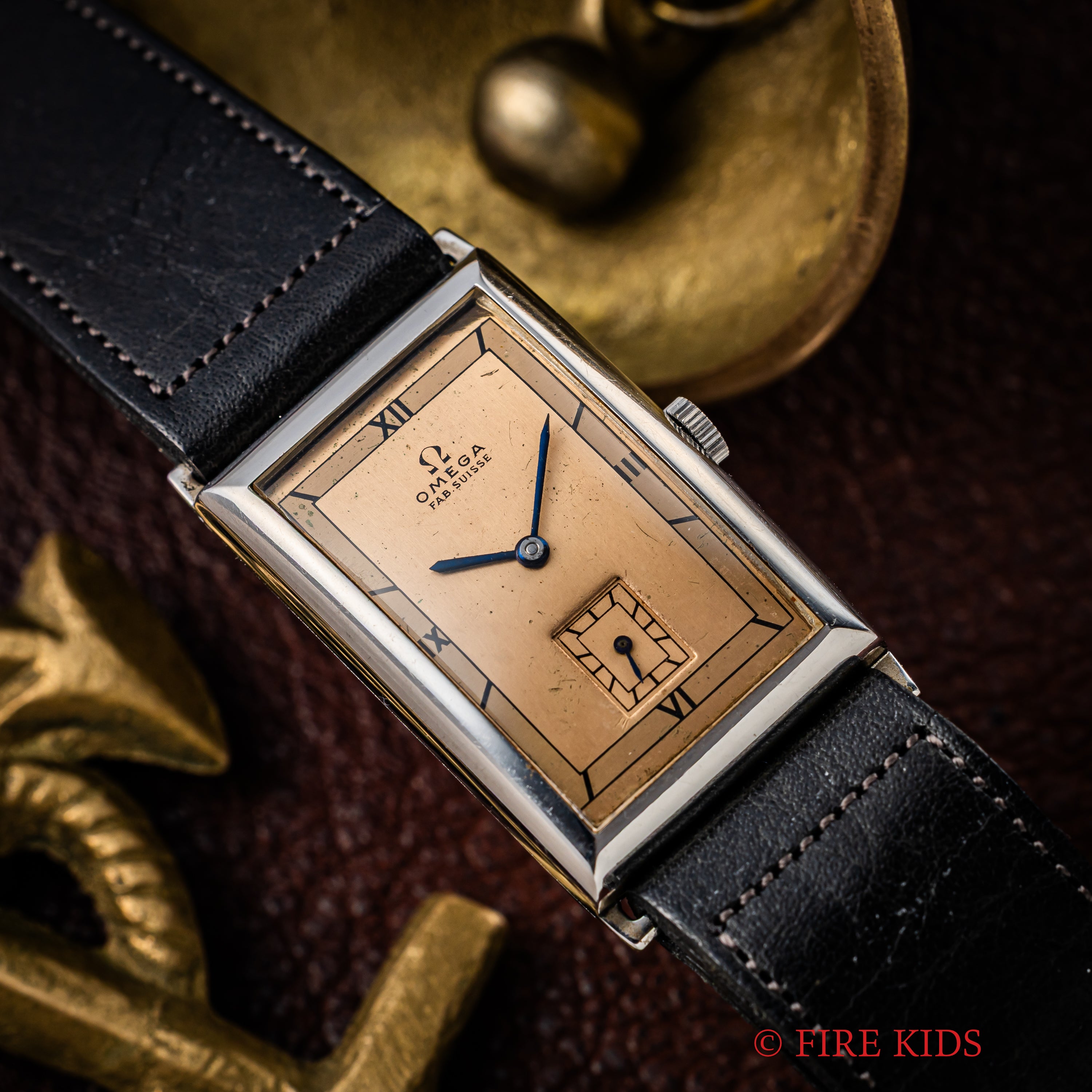 オメガ レクタンギュラーケース 飛びローマンカッパーダイヤル 1940年代製 手巻き Cal.T17