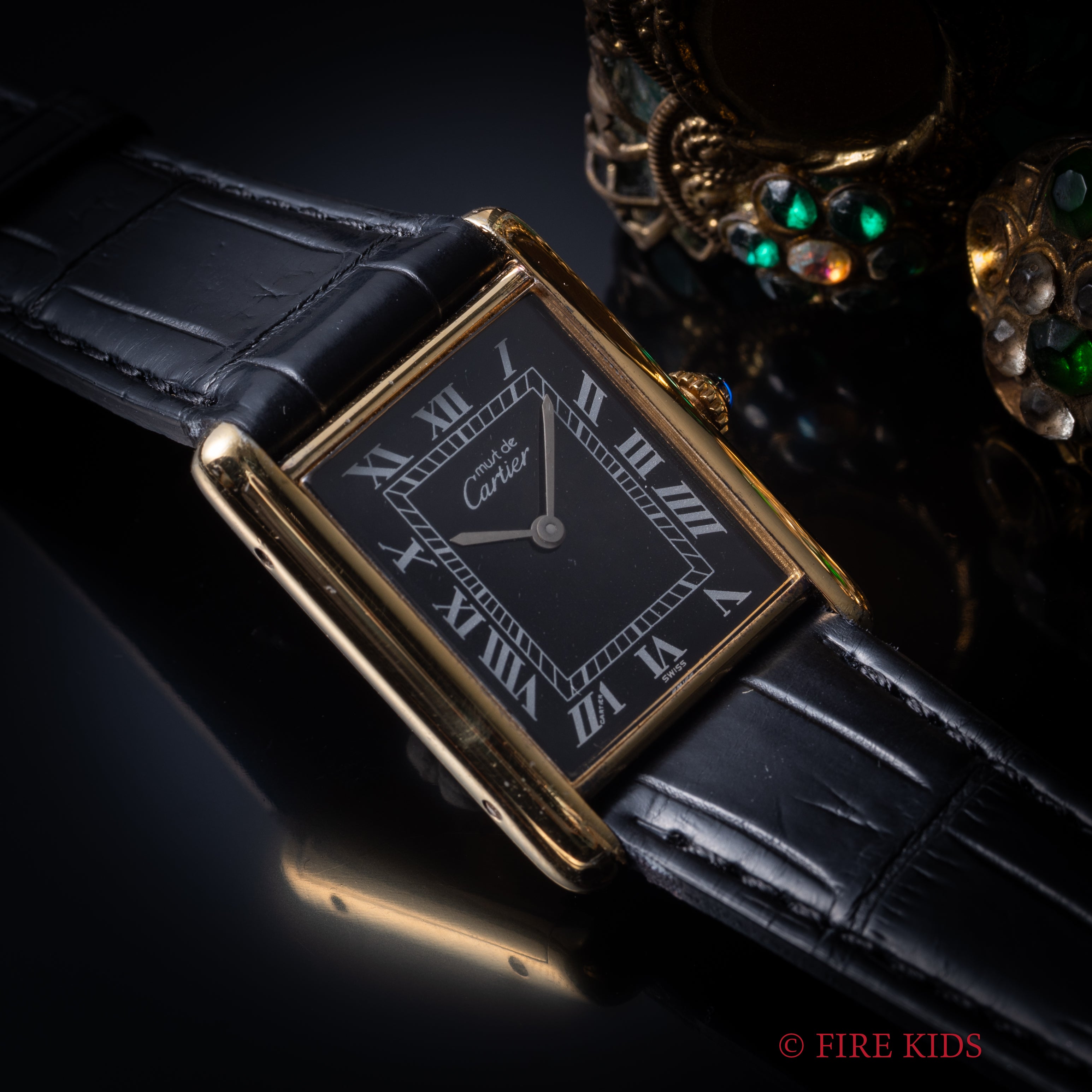 カルティエ マストタンク 1980年代製 LMサイズ ブラックローマンダイヤル 手巻 純正尾錠